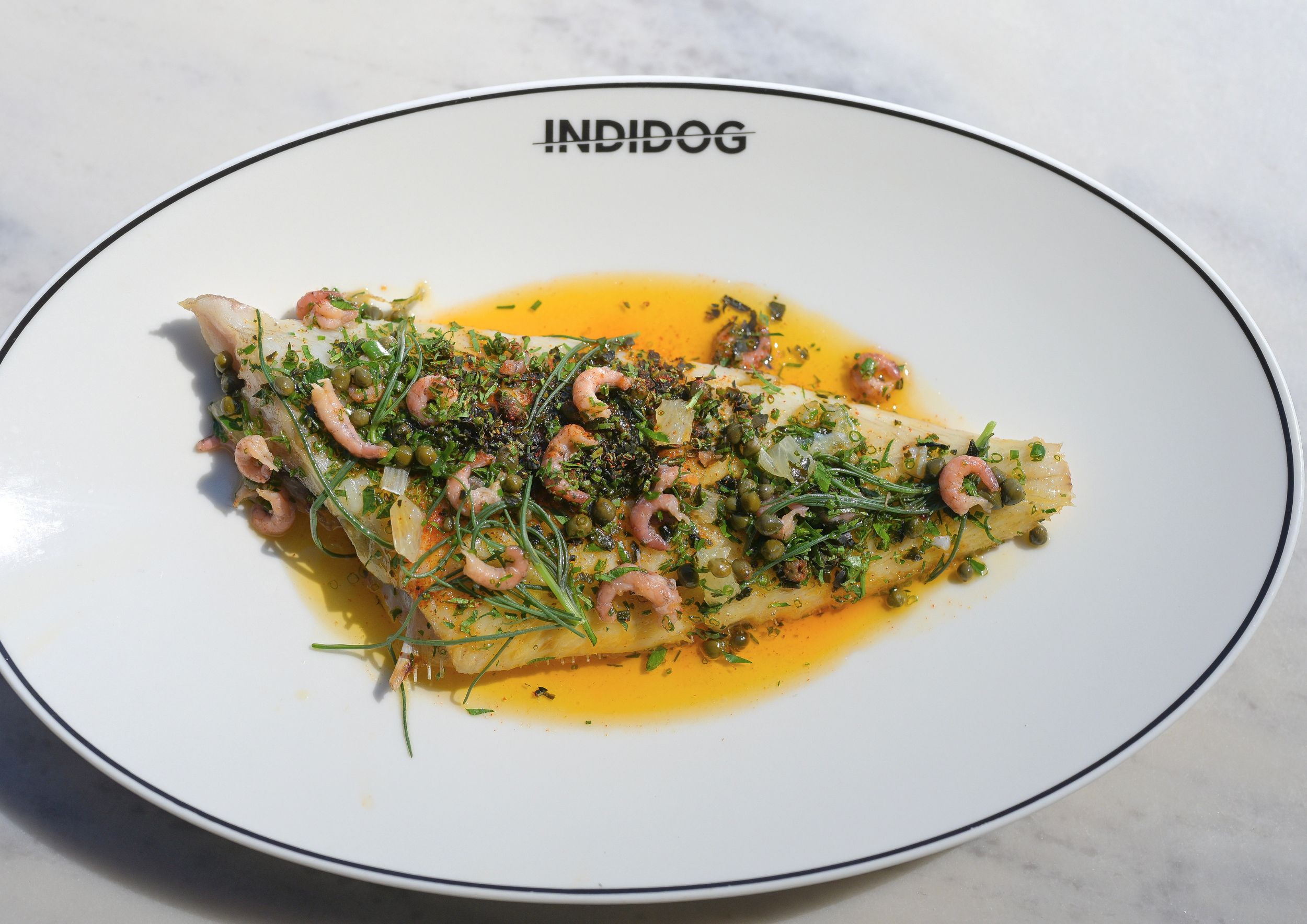 Lunch and dinner, harbourside at INDIDOG restaurant in Falmouth. From Burgers at lunch to oysters and daily catch. Lunch and dinner, harbourside at INDIDOG restaurant in Falmouth. From Burgers at lunch to oysters and daily catch.